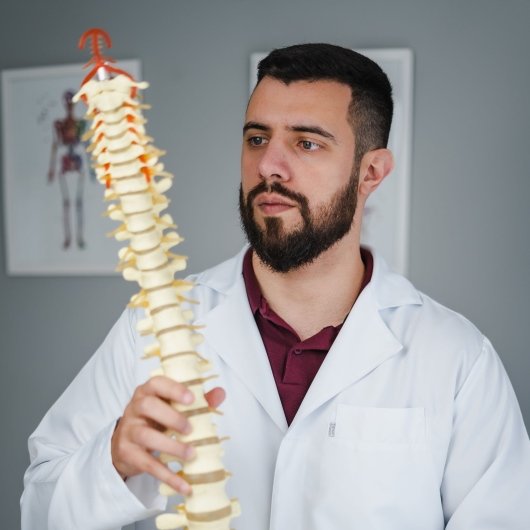 Dr. André Portera