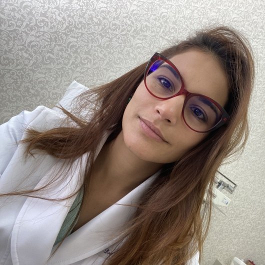 Dra. Flávia Santana Carvalho