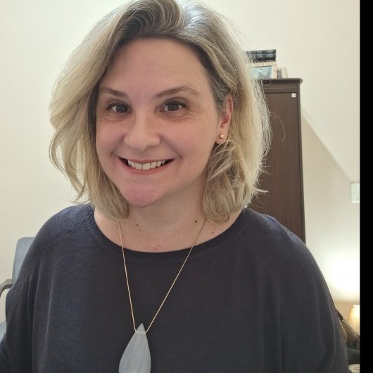 Dra. Adriana Meneghini
