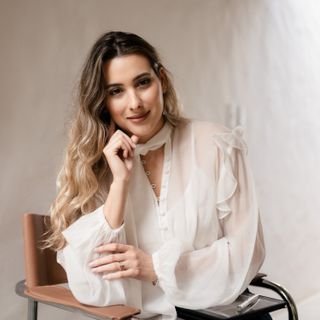 Dra. Luísa Camargo Thomé Cruz