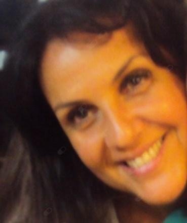Marcia C. Telles