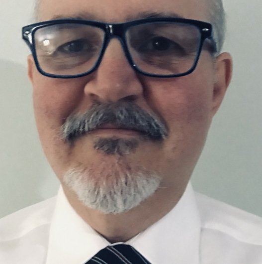 Dr. Carlos Puleghini