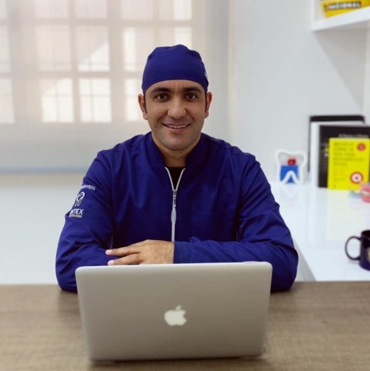 Dr. Raphael Donida