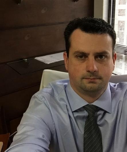 Dr. Carlos Eduardo Caldeira Santin
