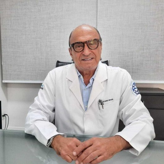 Dr. Claudio Gholmia