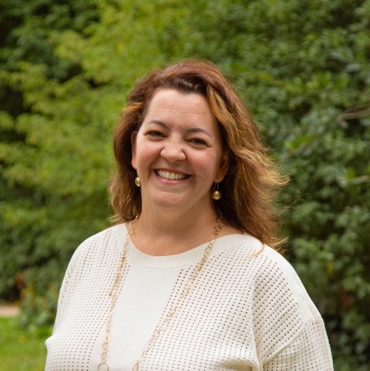 Dra. Andréa Lúcia Carneiro