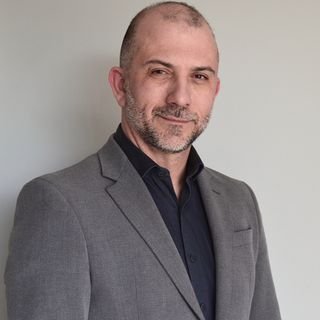 Dr. Michel Koury
