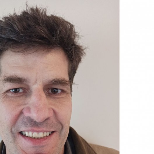 Dr. Alexandre Trentini
