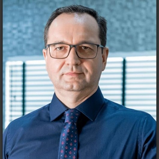 Dr. Arlei Belaus
