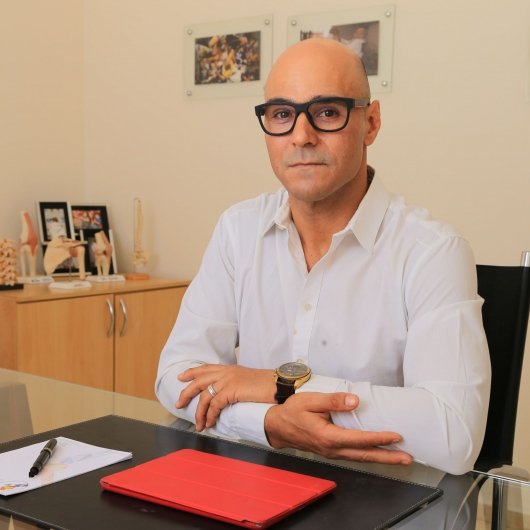 Dr. Gunter Sgarboza