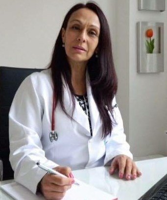 Dra. Claire Felomena Dos Santos Tesch
