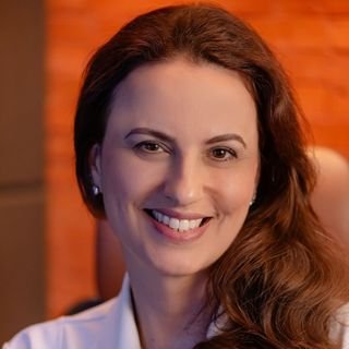 Dra. Flávia Ulhôa